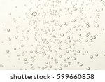 Many small fizz bubbles flows toward the surface