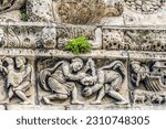 Small photo of Cain murders abel facade, nimes cathedral, gard, france. created 1100 ad