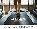 Happy new year 2024,2024 symbolizes the start of the new year. Close up of feet, sportswoman runner running on treadmill in fitness club. Cardio workout. Healthy lifestyle, guy training in gym.