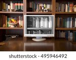Library with books and computer with image of books