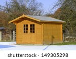 Timbered garden shed in snow