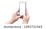 woman holding mobile phone on... | Shutterstock . vector #1392721565