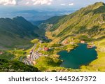 Panoramic view of glacial Lake Balea with Transfagarasan road in most famous place of Romania