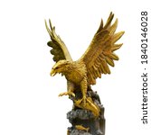 The golden eagle statue spreads ...
