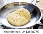 making pancakes, frying in a frying pan, kitchen, cooking, pancakes