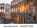 Architecture Details of the Roman Amphitheater Arena in Sunny Summer Evening. Famous Travel Destination in Pula, Croatia.