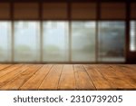 Wooden table of free space and blurred background of japan interior with big window . 