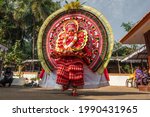 Small photo of Payyanur, India - December 5, 2019: Theyyam artist perform during temple festival in Payyanur, Kerala, India. Theyyam is a popular ritual form of worship in Kerala, India