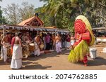 Small photo of Payyanur, India - December 5, 2019: Theyyam artist perform during Theyyam temple festival in Payyanur, Kerala, India. Theyyam is a popular ritual form of worship in Kerala, India