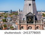 Small photo of DEN BOSCH, THE NETHERLANDS - JUNE 3, 2023: View on the inner city of Den Bosch, or 's-Hertogenbosch, part of the tower of St. Jan's cathedral in the front.