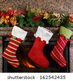 Photo of Full red festive Christmas stocking full of gifts | Free ...