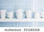 White Ceramic Cup Storage On A...