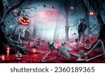 Small photo of Halloween - Skeletons In Spooky Forest At Moonlight - Jack O’ Lantern In Cemetery At Twilight