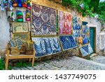 Romantic shopping place, picturesque paved old narrow street, cozy street gift market with expensive and stylish ornamental objects, Rovinj, Istria region, Croatia, Europe