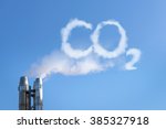 Smoke of chimney writing CO2 in the sky