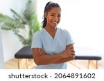 Small photo of A Portrait of young black Rehabilitation woman physiotherapist on a physio center