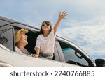 Small photo of Happy family day. Asian mother father and children smiling sitting in compact white car looking out windows, Summer at the beach, Car insurance, Family holiday vacation travel, road trip concept