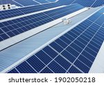 Small photo of Solar panels on a roof of a company Solar panels are a cheap and sustainable way to obtain energy from sunlight