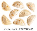Dumplings with fried onions isolated on white background. Varenyky, vareniki, pierogi, pyrohy with filling. Collection with clipping path.