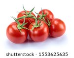 tomatoes in a cluster on a white background
