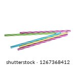 Small photo of Colourly striped plastic drinking straws, white underground background