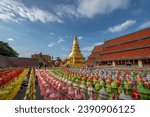 Small photo of Hundred thousand lantern festival in Lamphun is part of the Loi Krathong Festival or Yi Peng Festival To be offered as a Buddhist worship of Phra That Hariphun in lamphun, Thailand.