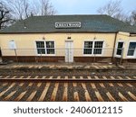 Small photo of Tuckahoe, New York - December 27, 2023. The Crestwood train station as depicted in the Normal Rockwell painting.