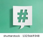 Speech bubble with hashtag symbol