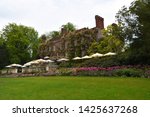 Small photo of TICEHURST, EAST SUSSEX, ENGLAND - MAY 18, 2019: The Georgian rear facade of Pashley Manor East Sussex.