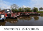 Small photo of WRENBURY, CHESHIRE, ENGLAND - APRIL 22, 2023: Narrow boats for hire at Wrenbury Cheshire on the Llangollen canal