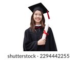 Small photo of College degree graduations. Happy young Asian girl in gown with mortarboard isolated on white background.