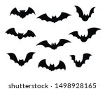 Black Silhouettes Of Bats Set...