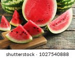 Slices of watermelons on cutting board