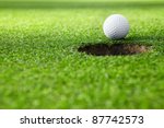 Golf Ball Next To Hole Free Stock Photo - Public Domain Pictures