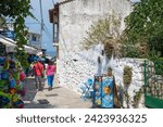 Small photo of AGIOS NIKITAS, LEFKADA, GREECE - AUGUST 25, 2023: Summer view of village of Agios Nikitas at Lefkada, Ionian Islands, Greece