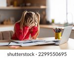 Small photo of Dyslexia Concept. Little Girl Struggling With Homework, Stressed Preteen Female Child Having Reading Difficulties, Sitting At Desk At Home, Looking At Book And Touching Head With Despair, Copy Space