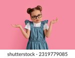 Small photo of I Don't Know. Doubtful Preteen Girl Shrugging Shoulders And Spreading Arms, Portrait Of Doubtful Female Kid Looking At Camera, Unsure Child Standing Isolated Over Pink Studio Background, Copy Space
