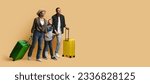 Small photo of Family vacation, summer trip together concept. Happy young black family tourists travelling together, father, mother and school aged son with suitcases looking at copy space on beige, web-banner