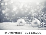 Silver Christmas Balls On Shiny ...