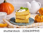 Small photo of Pumpkin and cottage cheese casserole bars. Delicious homemade autumn dish.