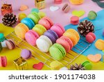 Colorful macarons dessert with vintage pastel tones. Colorful French macarons background, Different colorful macaroon background. Tasty sweet color macaron