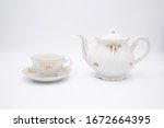 Vintage White Teapot With Tea...