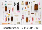 Small photo of Various medical equipment, thermometer, ampoules, pipette, drugs, tablets, capsules, spray, patch, syringe, vials on a white background. Medicine, pharmacy, hospital, treatment, pharmacy concept.