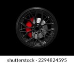 Small photo of Car alloy wheel and tyre isolated on black background. New alloy wheel with tire and yellow carbon ceramic brakes. Alloy rim isolated. Car wheel disc. Car spare parts.