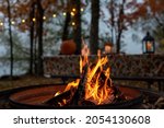 Closeup of glowing outdoor campfire in fall