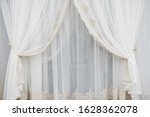 Curtains And Tulle In A Modern...