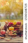 Small photo of Fall harvest cornucopia. Autumn season with fruit and vegetable. Thanksgiving day concept.