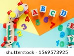 wooden kids toys on colourful... | Shutterstock . vector #1569573925