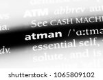 Small photo of atman word in a dictionary. atman concept.