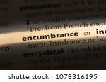 Small photo of encumbrance word in a dictionary. encumbrance concept